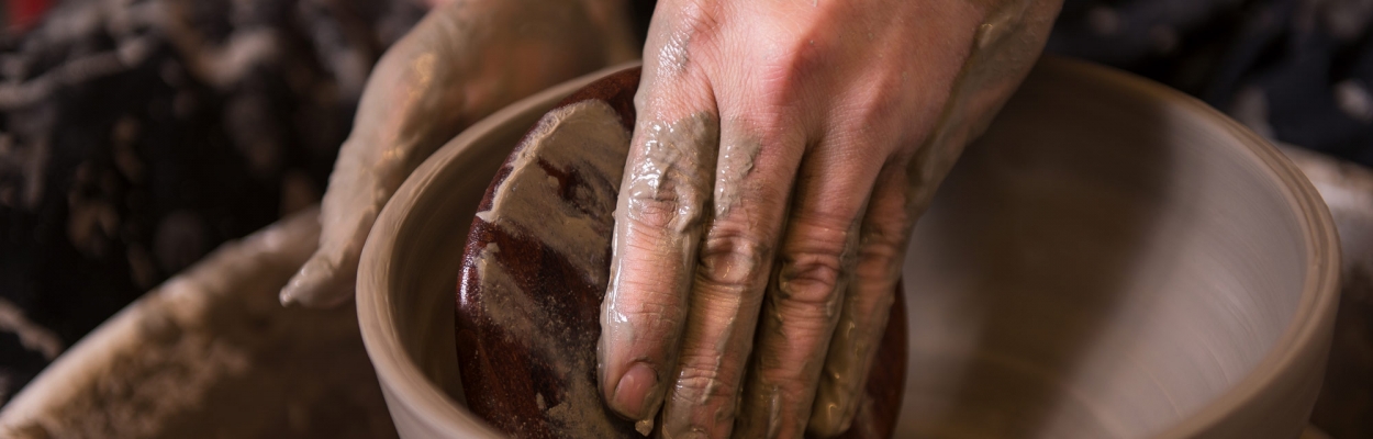 Picture of someone doing pottery